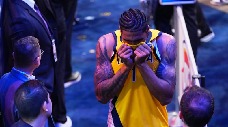 Indiana Pacers forward Obi Toppin (1) leaves the court after losing the NBA basketball championship in Game 7 against the Oklahoma City Thunder Sunday, June 22, 2025, in Oklahoma City. (AP Photo/Kyle Phillips)