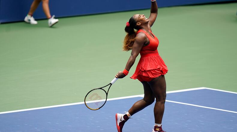 Serena Williams, of the United States, reacts during a match against Tsvetana Pironkova, of Bulgaria, during the quarterfinals of the US Open tennis championships, Wednesday, Sept. 9, 2020, in New York. (AP Photo/Seth Wenig)