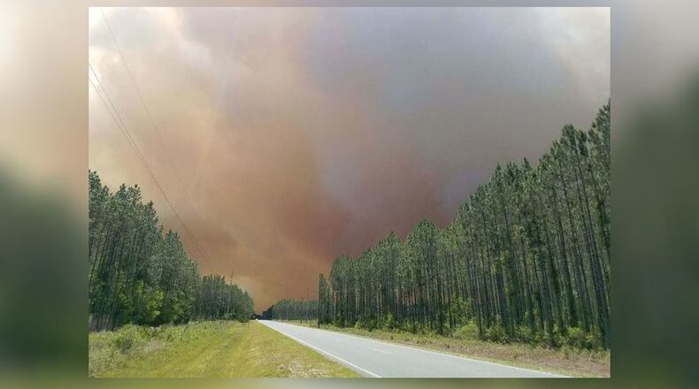 Smoke from the West Mims Fire was visible above this road in Charlton County, Ga. (Credit: Okefenokee National Wildlife Refuge)