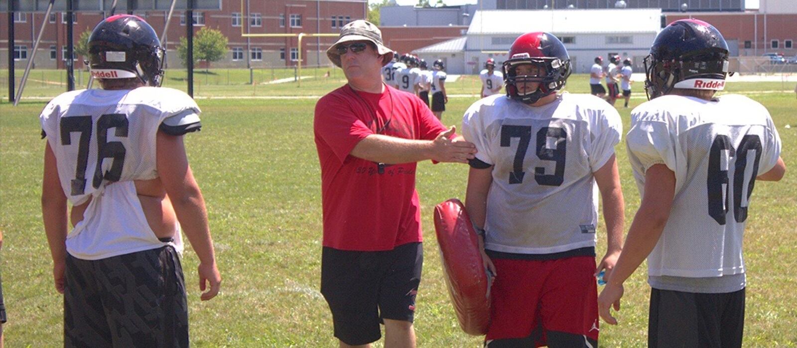 Tecumseh High School head football coach Kent Massie oversees a preseason practice in 2004. Jeff Gilbert/Contributor