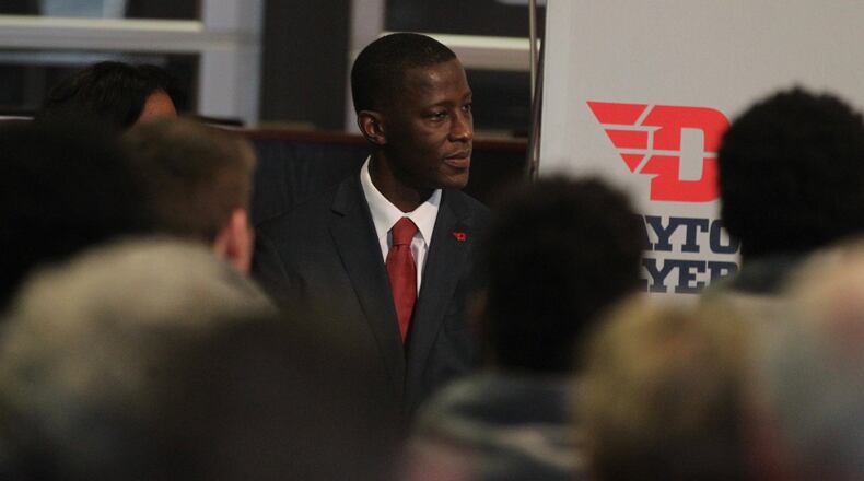 Dayton basketball coach Anthony Grant waits to speak at his introductory press conference on Saturday, April 1, 2017, at UD Arena. David Jablonski/Staff