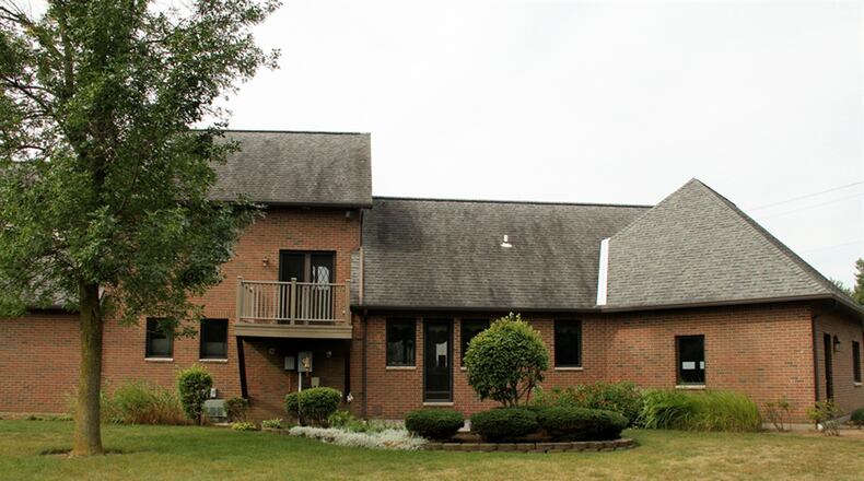 Balcony decks are accessible from an upstairs bedroom and the stairwell landing off the loft office area. The lower level has social rooms with volume ceilings and ceramic-tile flooring.