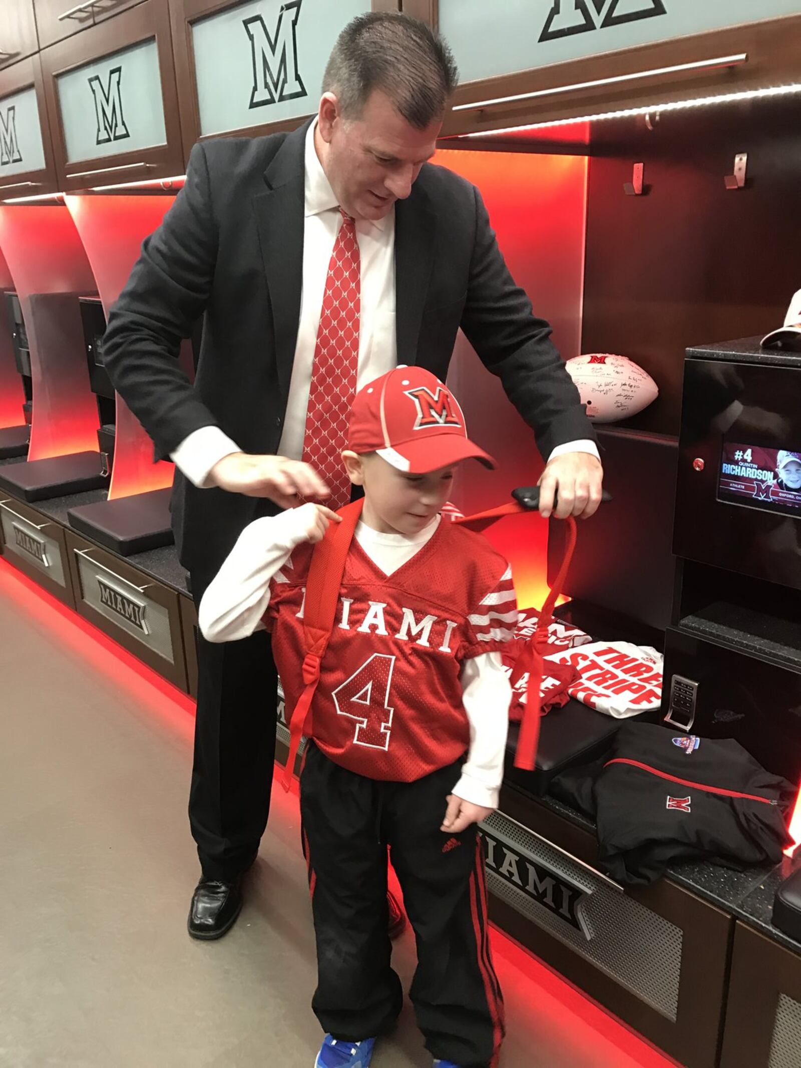 Miami coach Chuck Martin and Qunitin in the RedHawks dressing room. CONTRIBUTED PHOTO