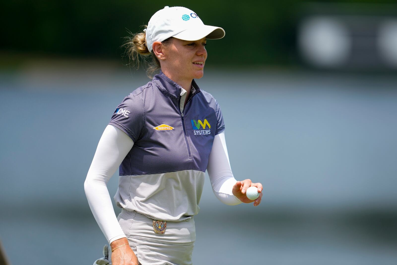 Sarah Schmelzel walks off the nineth green during the third round of the Chevron Championship LPGA golf tournament Saturday, April 26, 2025, in The Woodlands, Texas. (AP Photo/Ashley Landis)