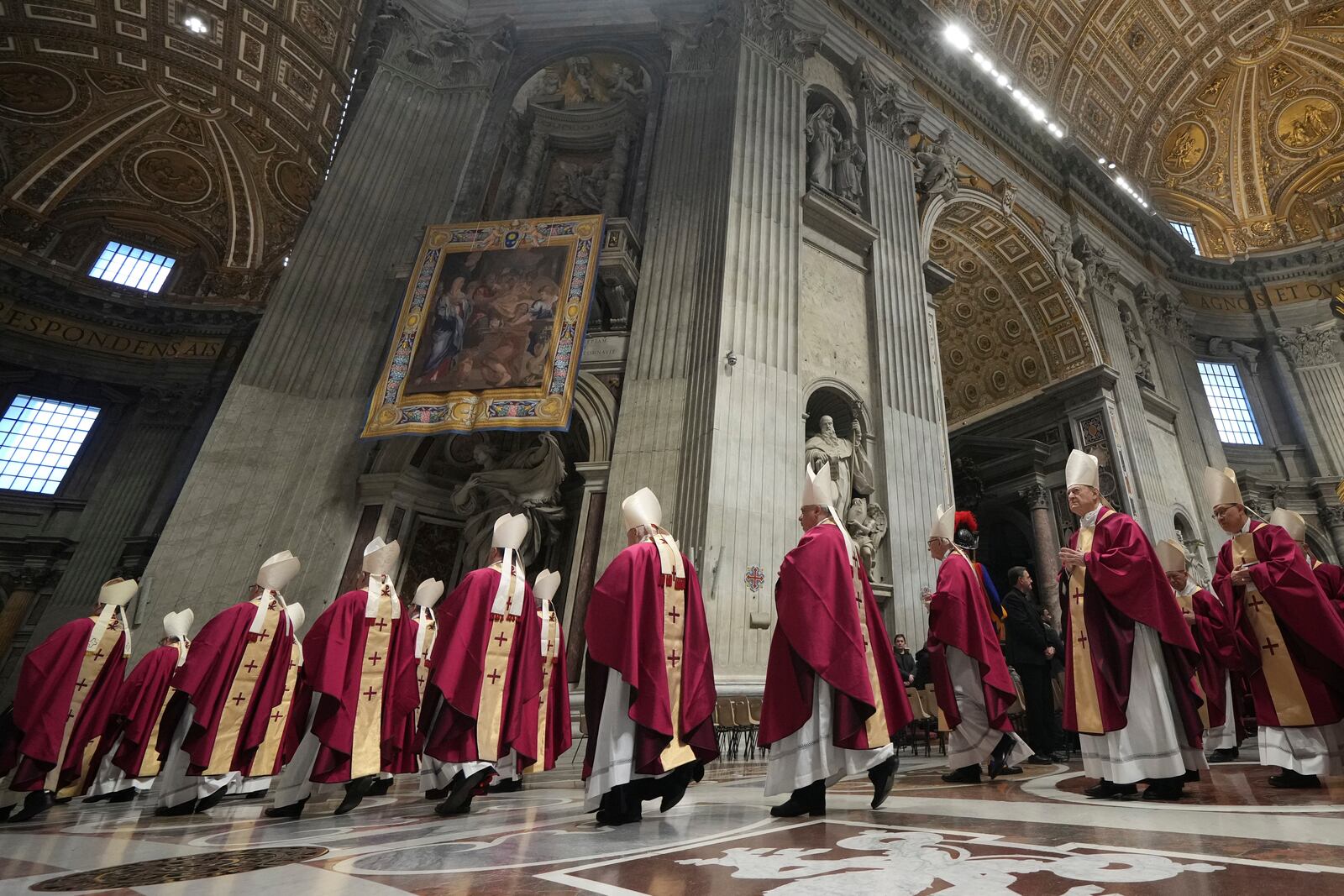 FILE - Cardinals leave St. Peter's Basilica after the funeral for late cardinal Angelo Amato in at the Vatican, Thursday, Jan. 2, 2025. (AP Photo/Alessandra Tarantino, File)