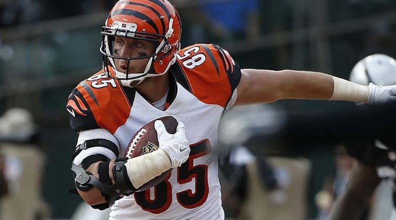 Cincinnati Bengals tight end Tyler Eifert (85) runs against the Oakland Raiders during the first half of an NFL football game in Oakland, Calif., Sunday, Sept. 13, 2015. (AP Photo/Tony Avelar)