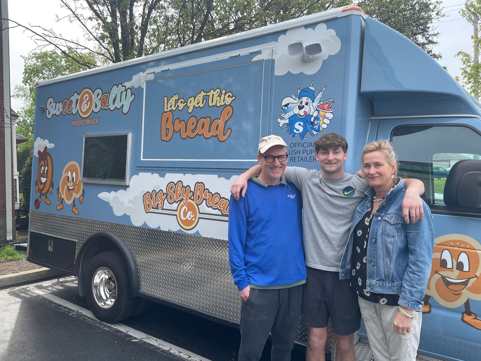 Big Sky Bread Company, a longtime Kettering bakery known for its pizza bread, pretzels and cinnamon rolls is going on wheels. Pictured left to right is Philip, Max and Mari Gallenstein. NATALIE JONES/STAFF
