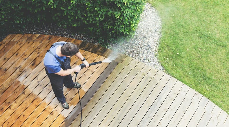 A professional will know the right type of cleaner and pressure washer to use for your project, ensuring the best results the first time around. (Dreamstime)