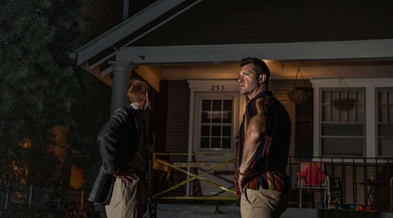 Ryan Hester (left, Joey) and Andrew Mitakides (Denny) portray complex Chicago police officers in Gem City Groundlings presentation of "A Steady Rain." CONTRIBUTED