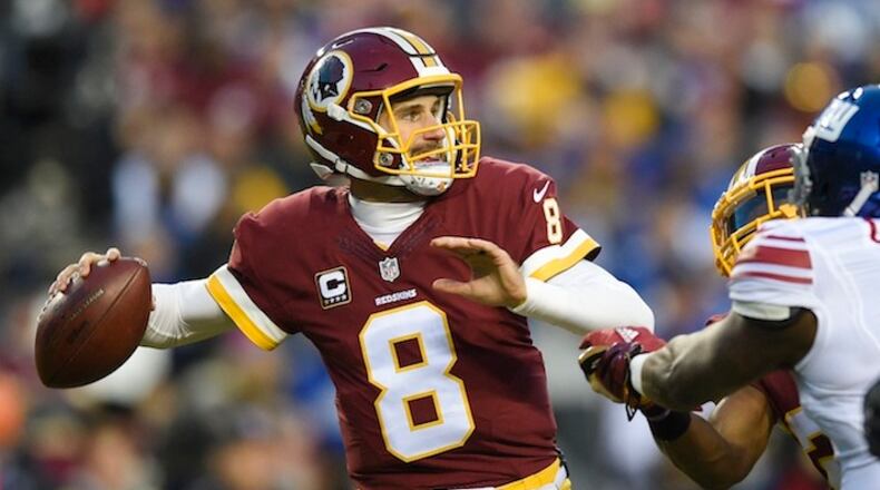 Washington Redskins quarterback Kirk Cousins (8) passes the ball during the first half of an NFL football game against the New York Giants in Landover, Md., Sunday, Jan. 1, 2017. (AP Photo/Nick Wass)