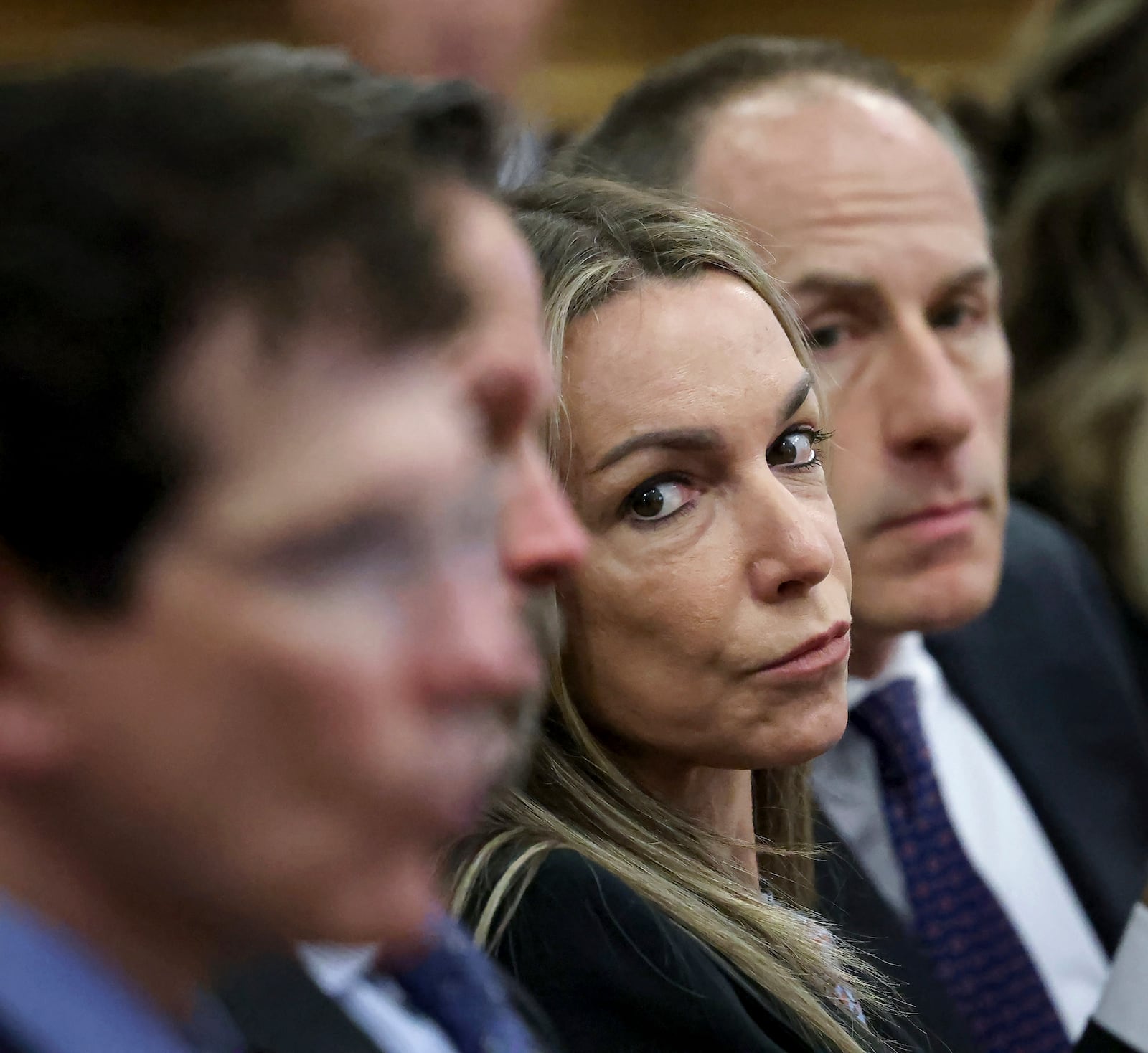 Defendant Karen Read sits with her defense team including David Yannetti, right, during closing arguments in her murder trial in Norfolk Superior Court, Friday, June 13, 2025, in Dedham, Mass. (Mark Stockwell/The Sun Chronicle via AP, Pool)