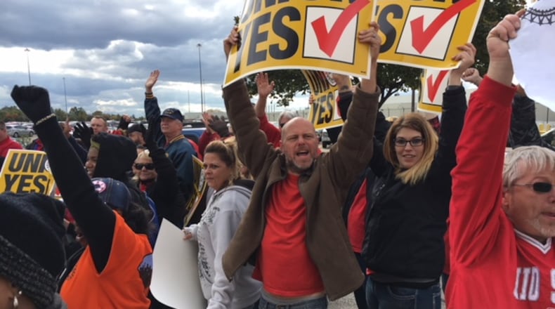 United Auto Workers and supporters rallied outside Fuyao Glass America in Moraine Oct. 25. THOMAS GNAU/STAFF