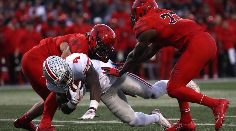 Ohio State’s Curtis Samuel rushes in front of Maryland defensive back Alvin Hill in the second quarter at Capital One Field at Maryland Stadium on November 12, 2016 in College Park, Maryland. (Photo by Patrick Smith/Getty Images)
