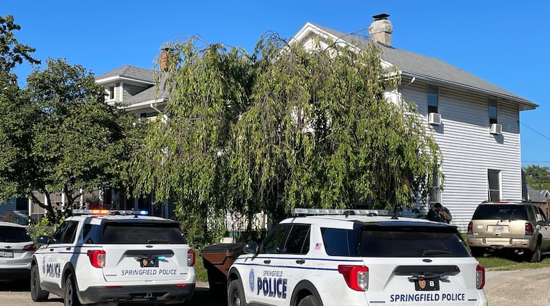 Springfield police and fire personnel were on the scene at a house in the 200 block of North Clairmont Avenue where a 1-year-old boy was found in a backyard pool Thursday, Aug. 31, 2023. BILL LACKEY/STAFF