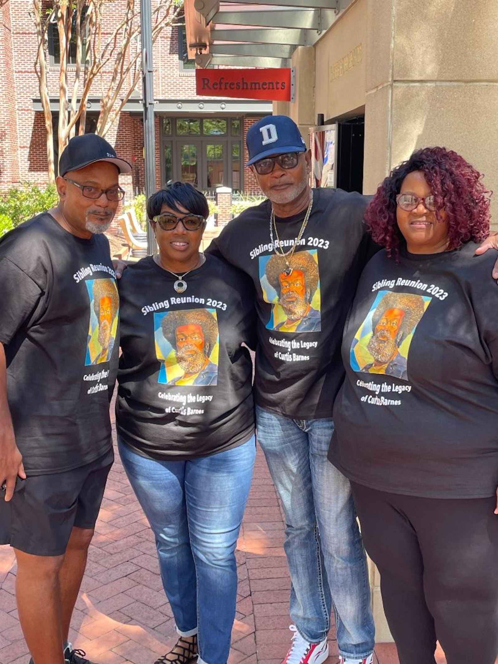 In honor of the late Curtis Barnes Sr., his children reunite every year for a sibling reunion. They take turns hosting the  reunion and designing a T-shirt featuring their father's artwork. 
Pictured left to right: Kevin Robinson, Diana Barnes Cary, Dalton Pitt, and Danita Barnes Sani.
CONTRIBUTED