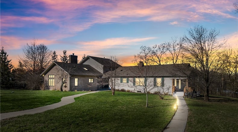This seven bedroom, 5,000 square foot home sits on 2.2 acres in Miamisburg. The original ranch house was built in 1910 but it has been fully updated and renovated by adding a two story addition and creating two separate residences. CONTRIBUTED