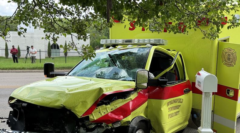A Springfield Twp. ambulance and three other vehicles were heavily damaged in a crash in the 1900 block of South Burnett Road Monday, July 22, 2024. BILL LACKEY/STAFF