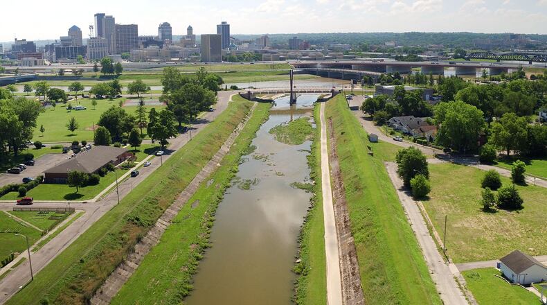 Wolf Creek looking east toward downtown Dayton. TY GREENLEES / STAFF