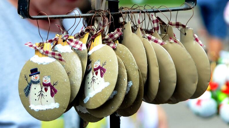 Kettering’s popular Holiday at Home festival is back in 2021, after being canceled last year because of the pandemic. The two-day event, which features a car show, a parade, arts and crafts vendors and more, took place Sunday and Monday, Sept. 5-6, at
the Kettering Government Center and Fraze Pavilion in Kettering. The theme for 2021 is “Hometown Spirit Let’s Hear It!” CONTRIBUTED/DAVID A. MOODIE