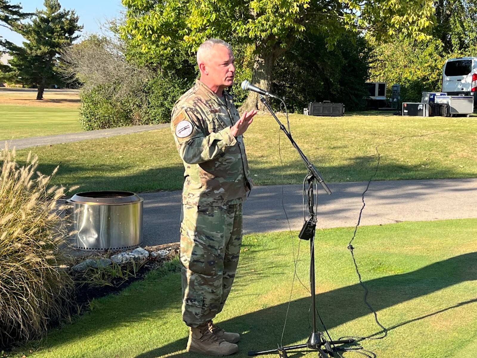 Col. Christopher Meeker, 88th Air Base Wing commander, speaking outside the Wright Patt Club at Wright-Patterson Air Force Base Thursday. THOMAS GNAU/STAFF