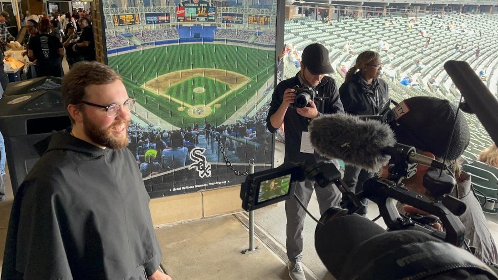 Brother David Marshall, a Dayton native and Chaminade Julienne graduate, being interviewed June 14 at Rate Field in Chicago. CONTRIBUTED
