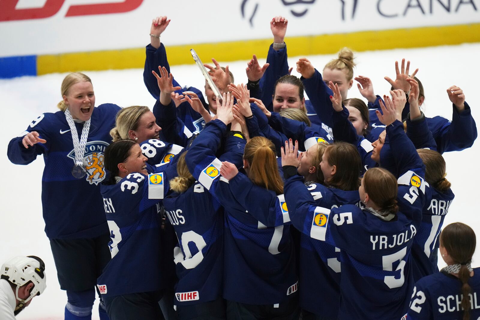 Finland's celebrate after winning the bronze medal match between Czech Republic and Finland at the Women's Ice Hockey Championships in Ceske Budejovice, Czech Republic, Sunday, April 20, 2025. (AP Photo/Petr David Josek)