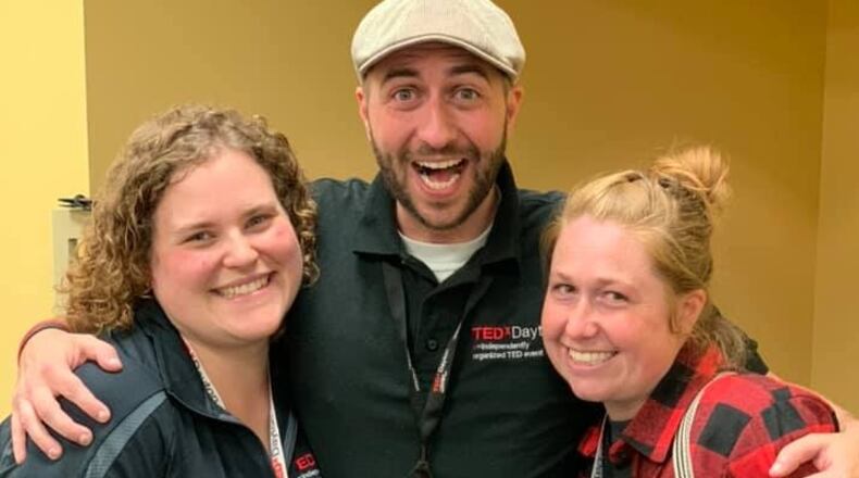 Sean Mitchell, middle, has connected with others through his volunteer work and jobs.