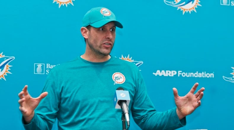 Miami Dolphins head coach Adam Gase gestures as he speaks during a news conference, Tuesday, July 25, 2017 at the Dolphins training facility in Davie, Fla. Gase believes his roster is more talented than a year ago when he was a rookie coach for the Dolphins, who start training camp Thursday. (AP Photo/Wilfredo Lee)