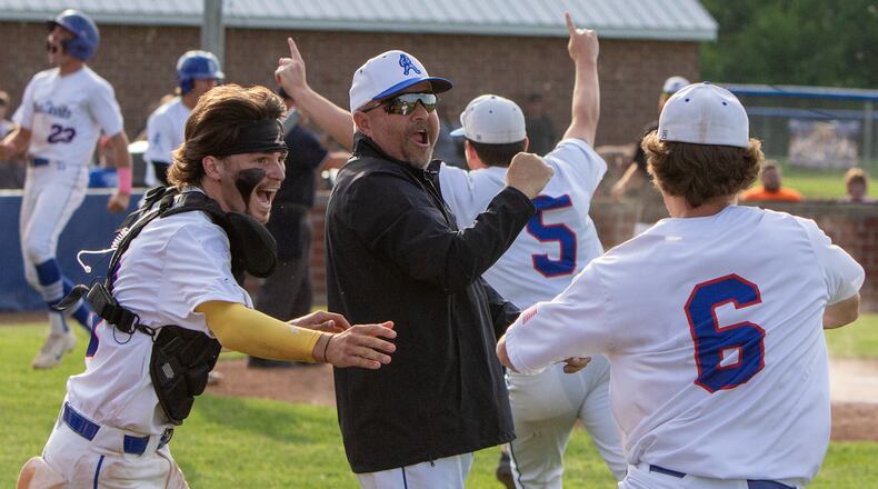Brookville catcher Monday's Kayde Baker and the rest of the team celebrate Monday's tournament win at home against Greeneview. Jeff Gilbert/CONTRIBUTED
