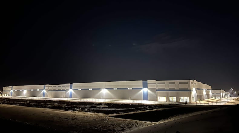 A massive 826,780-square-foot warehouse sits illuminated Feb. 12, 2026, in the El Paso suburb of Socorro, Texas, that was recently purchased by the U.S. Department of Homeland Security for $122.8 million. (ASP Photo/Morgan Lee)