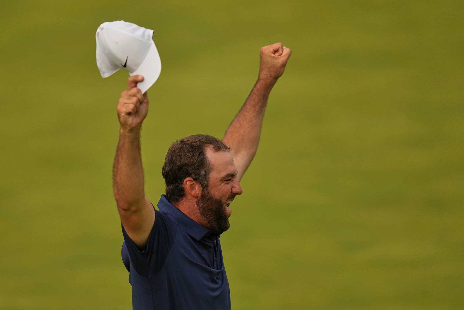 Scottie Scheffler of the United States celebrates after winning the British Open golf championship at the Royal Portrush Golf Club, Northern Ireland, Sunday, July 20, 2025. (AP Photo/Francisco Seco)