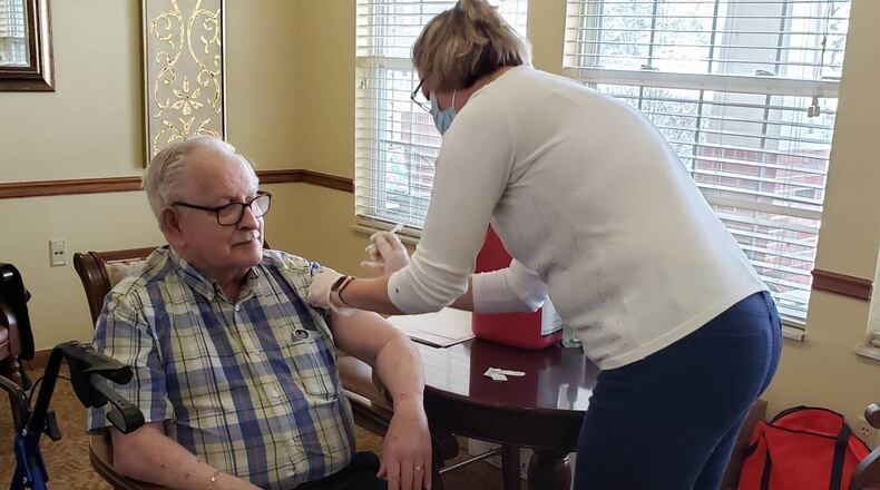 Resident Ron Colombe of Miller Farm Place senior living in Vandalia receives a COVID-19 vaccine dose. CONTRIBUTED