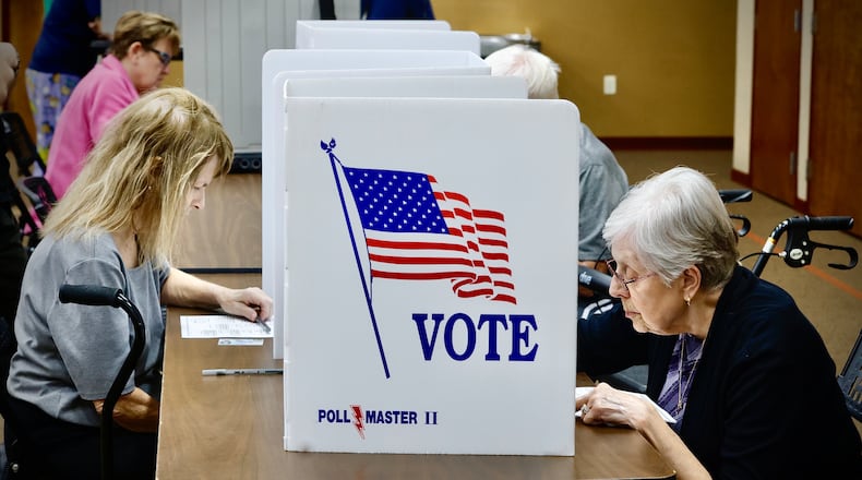 Voters cast their ballots at the North Huber Heights Baptist Church on Tuesday, Nov. 5, 2024. MARSHALL GORBY / STAFF
