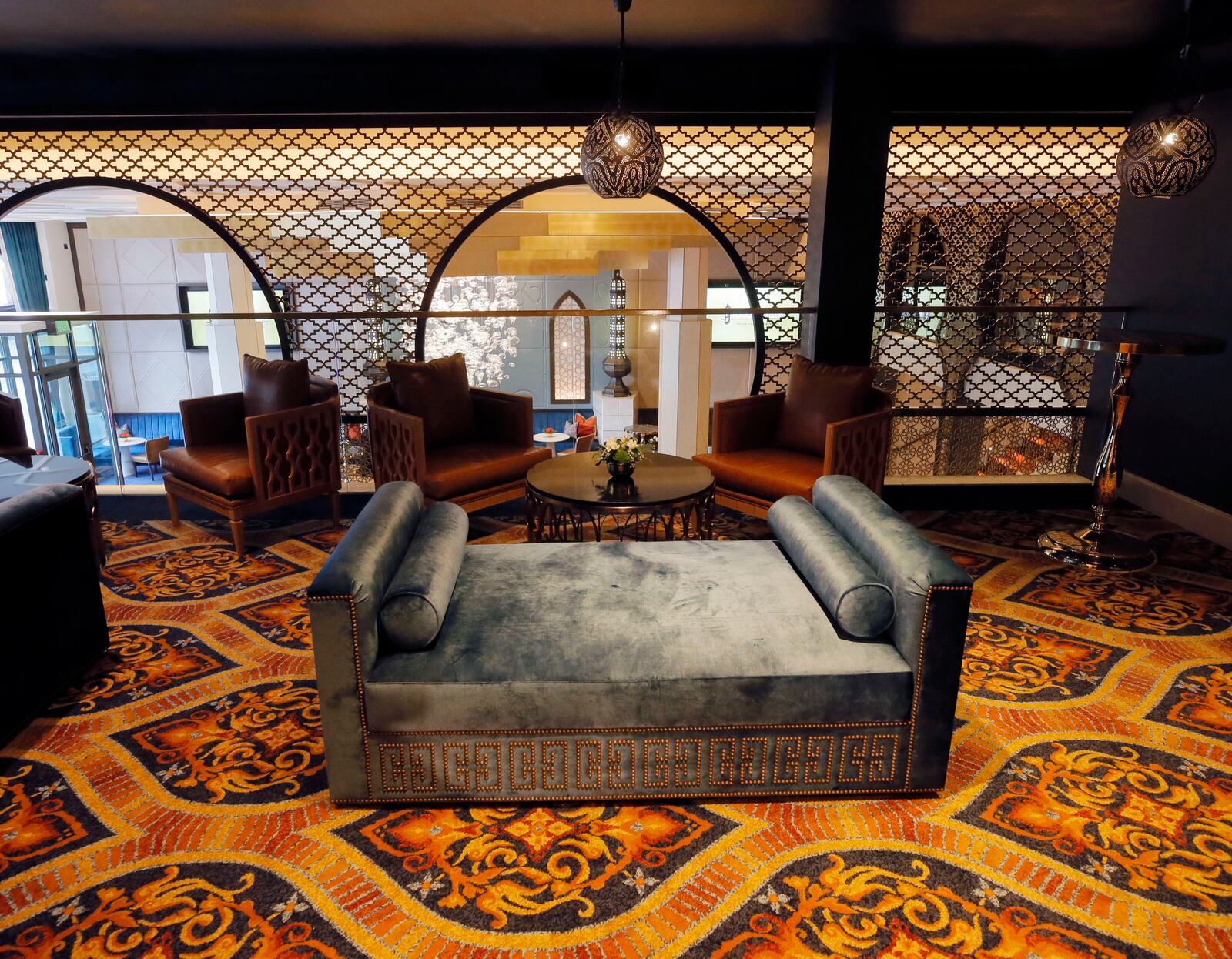 The Mezzanine Level overlooks the Main Level through a screen.  