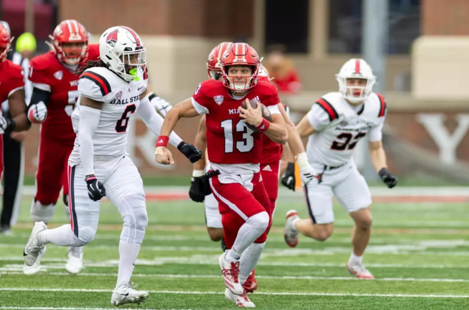 Miami's Thomas Gotkowski (13) scrambles for extra yards against Ball State on Saturday, Nov. 29, at Yager Stadium. JEFFREY SABO / MIAMI ATHLETICS