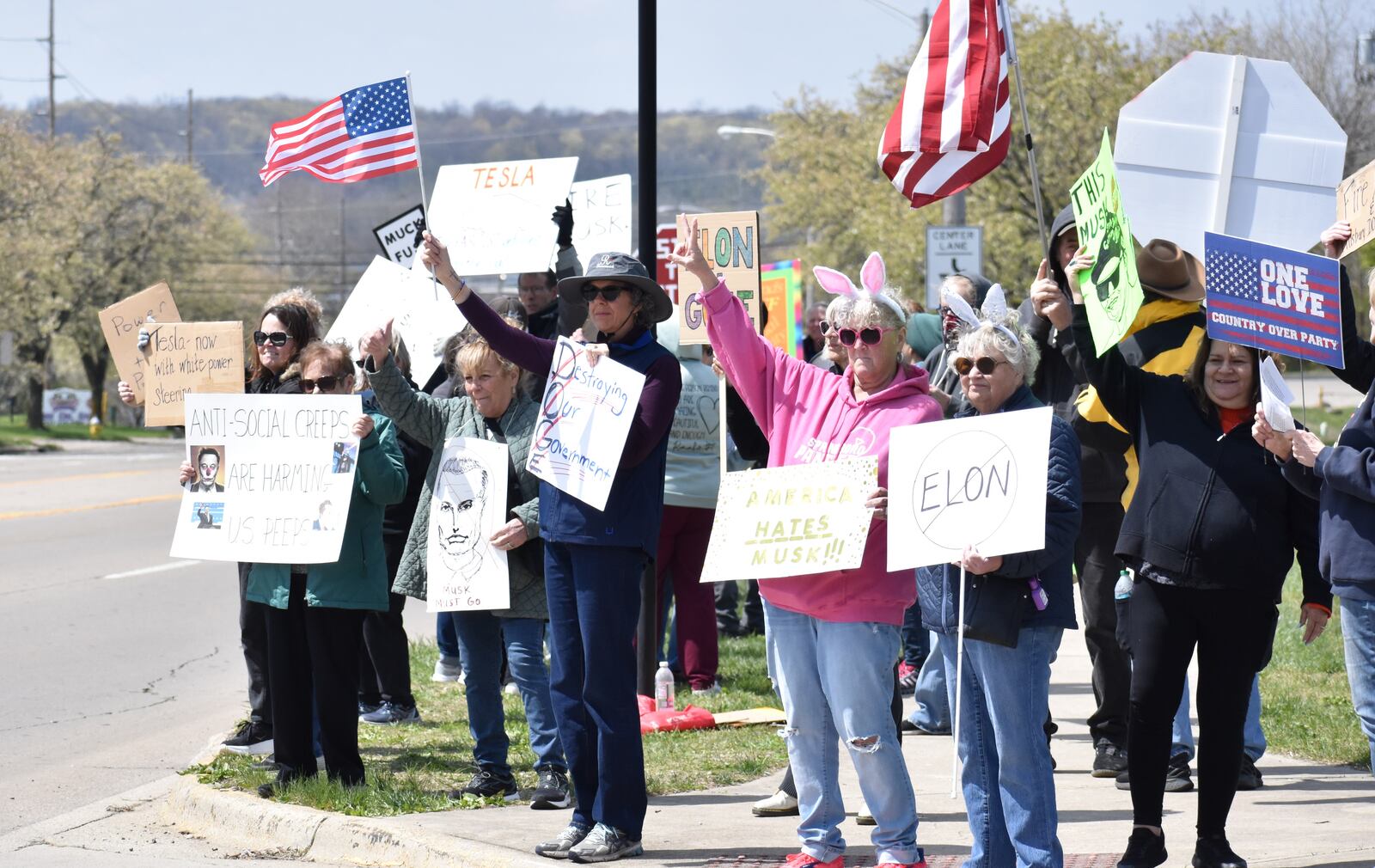 Anti-Musk protests continued on Saturday, April 12, 2025, at a Tesla facility in Moraine. People are the protest said veterans, Social Security, Medicare, Medicaid and other social services were at the top of their concerns. SAM WILDOW/STAFF