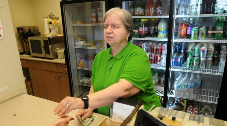 Judy Good working in the snack bar in the Government Services Center in 2009. FILE PHOTO