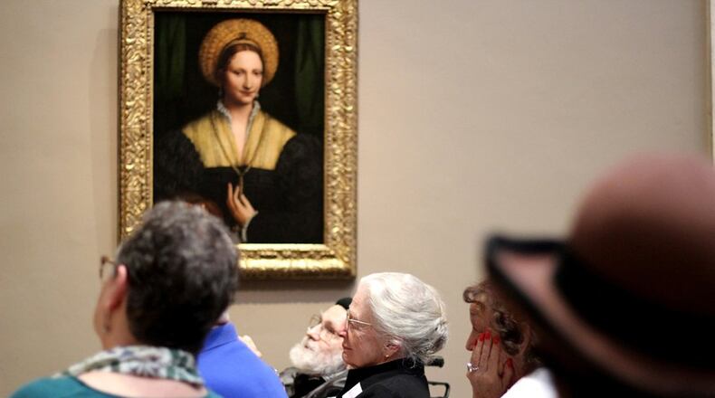 A group of older adults and their caregivers analyze and discuss works of art on March 5, 2018, as part of the National Gallery’s Just Us program in Washington, D.C. (Lynne Shallcross/KHN/TNS)