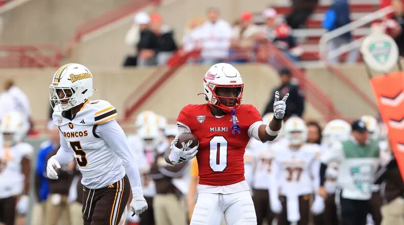 Miami’s Keith Reynolds reacts after making a first down against Western Michigan on Saturday at Yager Stadium. CHRIS VOGT / CONTRIBUTED