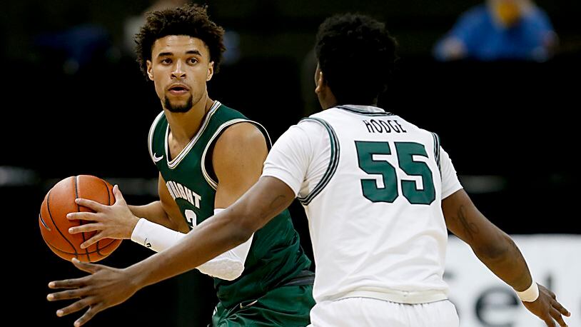 Wright State guard Tanner Holden is covered by Cleveland State guard D’Moi Hodge during a Horizon League game at the Nutter Center in Fairborn Jan. 16, 2021. Wright State won 85-49. Contributed photo by E.L. Hubbard
