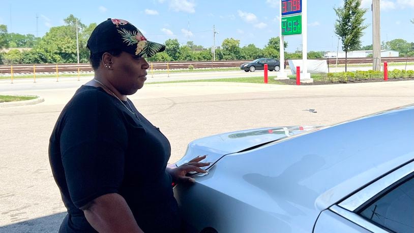 Wilma Sampson, of West Dayton, said she traveled out of her neighborhood, where gas prices were still over $4 per gallon Thursday, to fill up for $3.79 per gallon at Circle K on West Dorothy Lane. AIMEE HANCOCK/STAFF