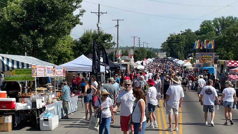 Tens of thousands of Americana Festival attendees spent time along Ohio 48 in Centerville Monday, the 50th anniversary of the event. NICK BLIZZARD/STAFF