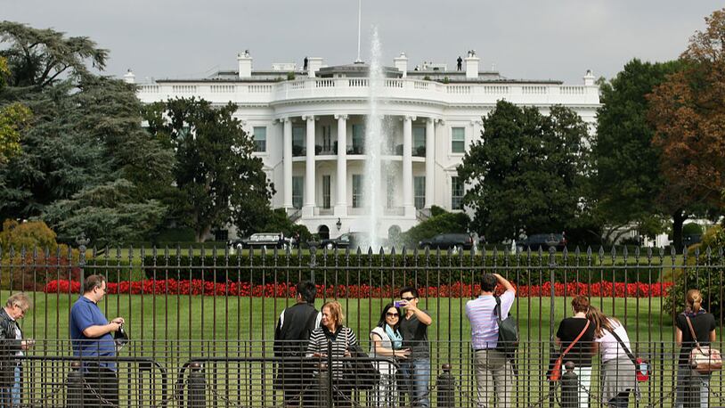 Tourists visit the south side of the White House in Washington, DC. The Secret Service said that the south sidewalk will be off-limits to tourists from now on.
