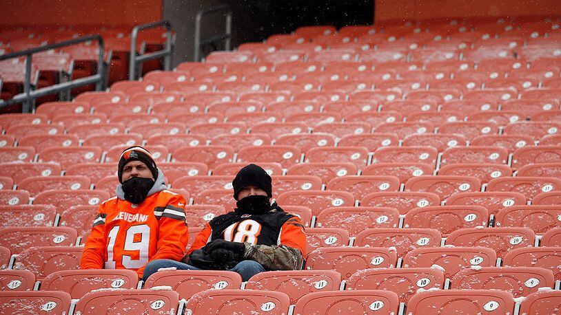 CLEVELAND, OH - DECEMBER 11: Fans of the Cleveland Browns and the Cincinnati Bengals sit together before the game at Cleveland Browns Stadium on December 11, 2016 in Cleveland, Ohio. (Photo by Justin K. Aller/Getty Images) *** Local Caption ***