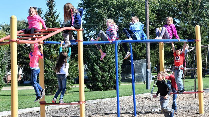 Students at Troy’s Cookson Elementary School spend time on the school’s playground. The school district is asking voters to approve a bond issue to build two new schools, one for prekindergarten through grade two students and the other for grades three through six. CONTRIBUTED