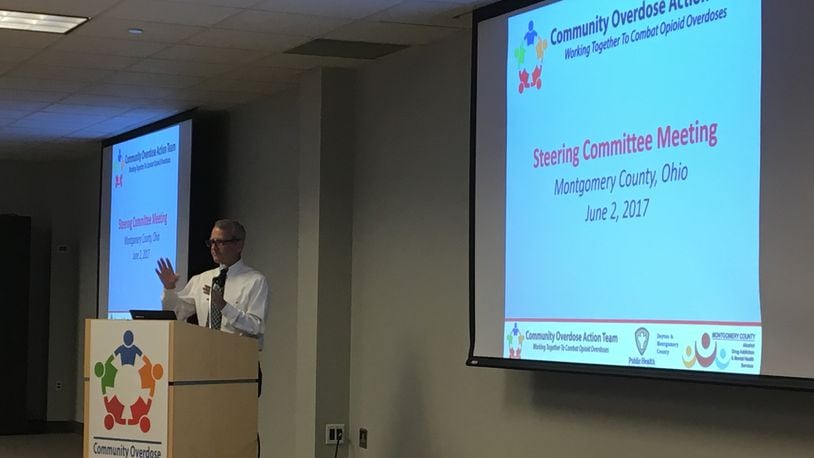 Montgomery County Commissioner Dan Foley kicks off a meeting of the Community Overdose Action Team steering committee at the Business Solutions Center, Friday, June 2, 2017.