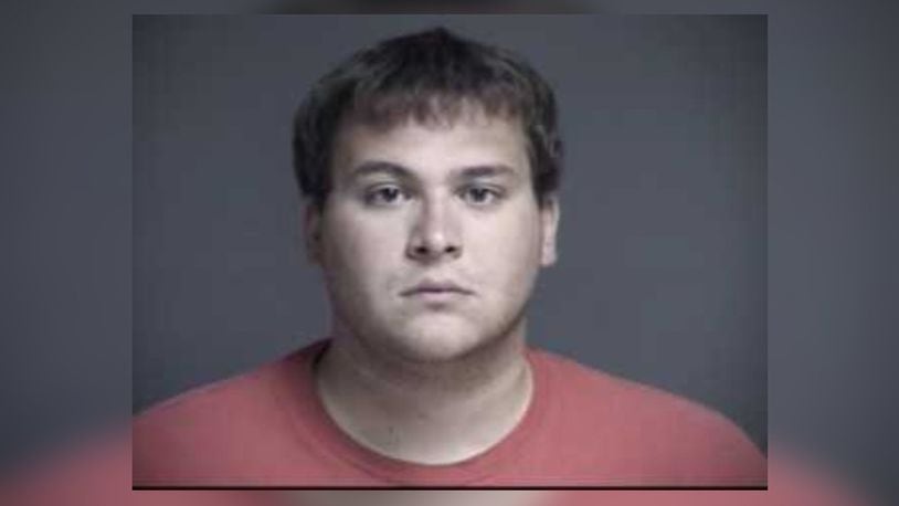 John Austin Hopkins, 25, of Springboro was indicted Monday on 36 counts of gross sexual imposition involving 28 girls under 13 years old in his class at Clearcreek Elementary School in Springboro.