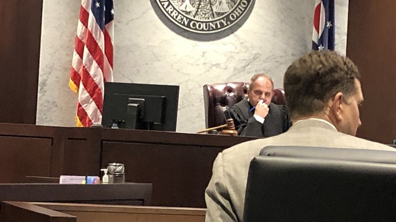 Lawyer Martin Hubbell discusses the case of the 12-year-old Springboro student charged in connection with a school dance lockdown with Judge Joe Kirby. STAFF/LAWRENCE BUDD