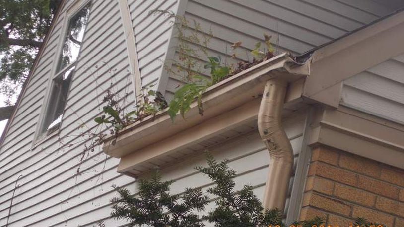 The National Fair Housing Alliance released this photo Thursday of what the alliance says is a home in Milwaukee with severely obstructed gutters. CONTRIBUTED.