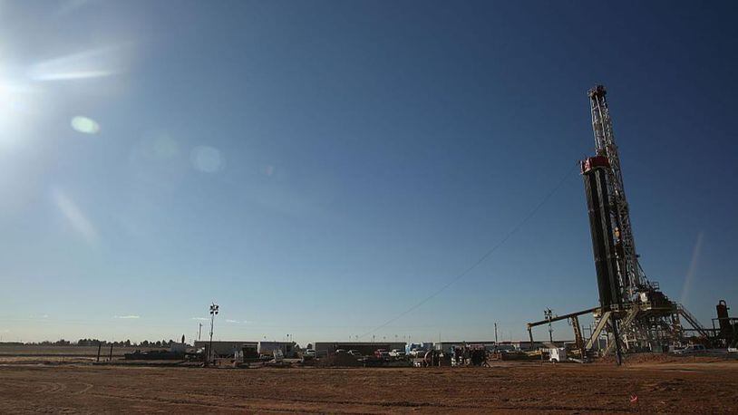 A fracking site is situated on the outskirts of town  in the Permian Basin oil field on January 21, 2016 in the oil town of Midland, Texas. (Photo by Spencer Platt/Getty Images)